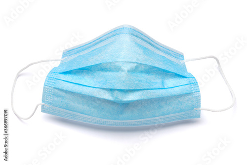 Disposable blue medical face mask isolated on white background with clipping path