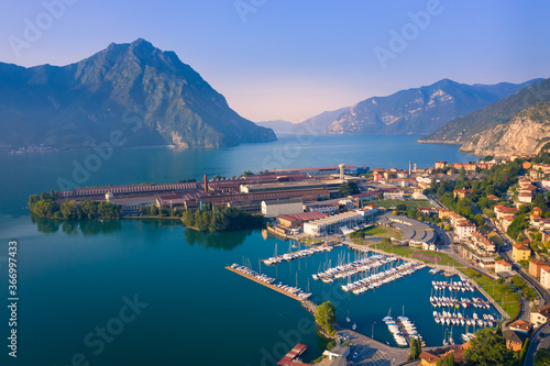 Aerial view of Lake Iseo at sunrise, on the right the port of lovere,background mountains(alps), Bergamo Italy.