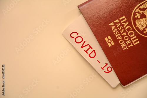 Coronavirus concept background. Passport and note on table with space for text, copy space