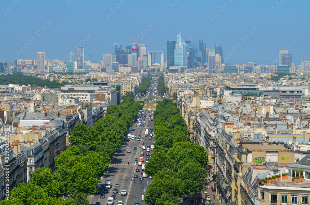Panorama of Paris with modern district La Defense on the deep.