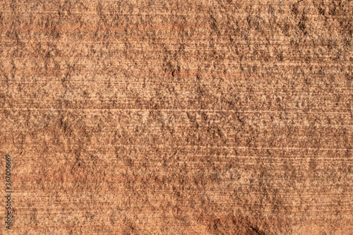 texture of a red rock with horizontal lines