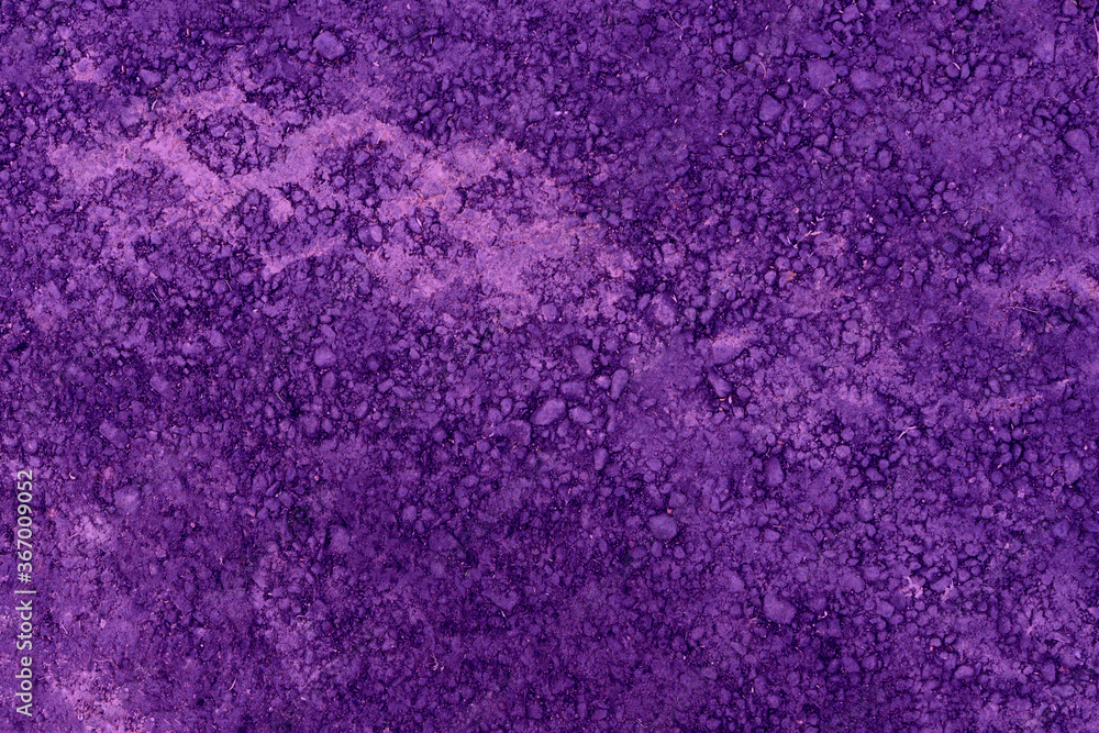 Purple sand with small pebbles background