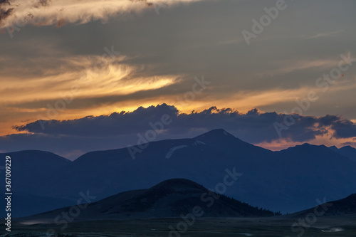 Mountain landscape at sunset. Outstanding view of the mountain ridges and clouds in Altai of Mongolia © Tatiana