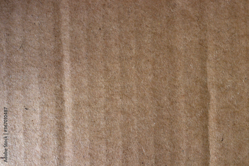 Fototapeta premium Brown cardboard texture with corrugated texture, background