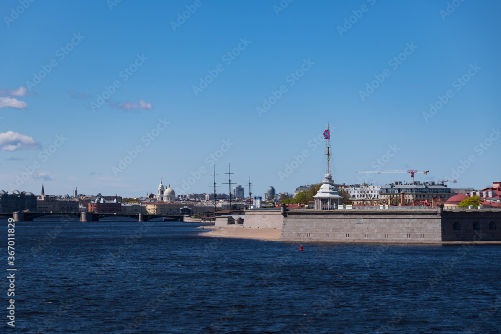 View of the Naryshkin bastion of the Peter and Paul Fortress, the Neva River and the Birzhevoy Bridge. St. Petersburg, Russia.