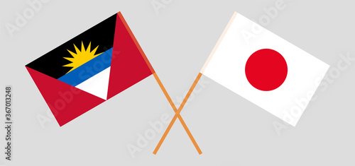 Crossed flags of Japan and Antigua and Barbuda