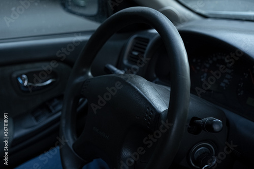 Car dashboard and steering wheel © Nariman