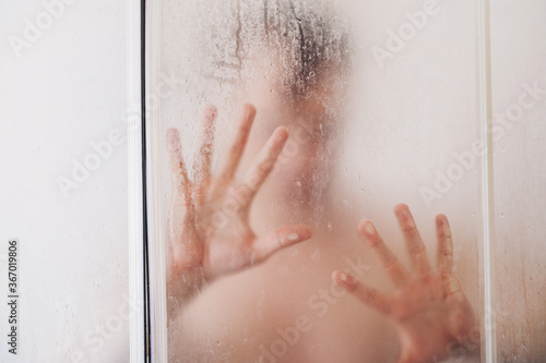 scary palm of hand behind shower curtain background 