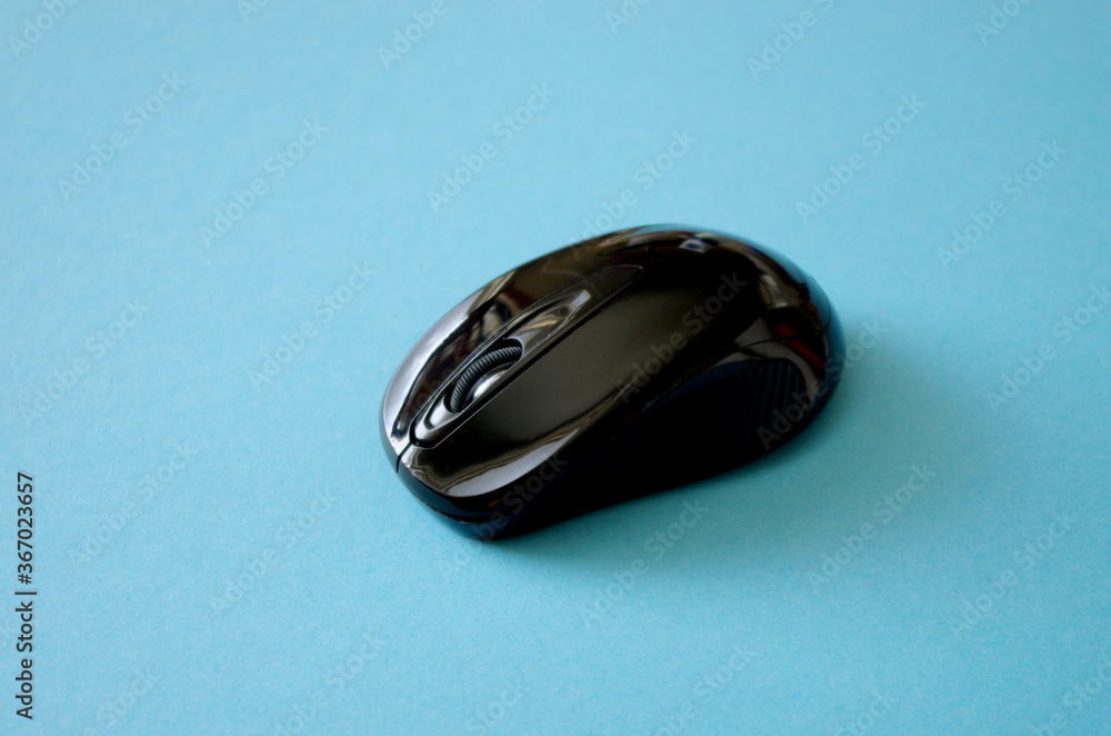 wireless computer mouse on blue background, office, business, or home office concept, pc gaming wireless computer mouse on blue background, office, business, or home office concept, pc gaming