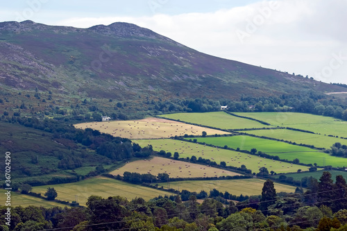 Photography Beautiful view of the mountains and fields in Ireland