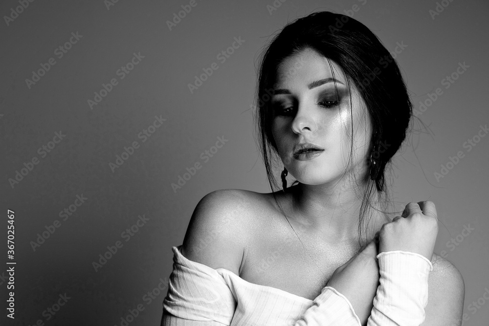 BW portrait of a sensual girl with naked shoulders BW portrait of a sensual girl with naked shoulders