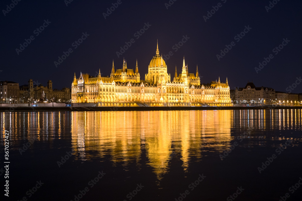 Fototapeta premium Hungarian Parliament in Budapest against black