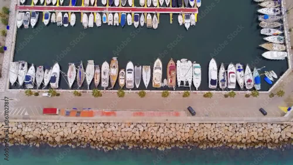 Aerial view of a boats and yachts moored in marina Drone Footage Aerial view of a boats and yachts moored in marina Drone Footage