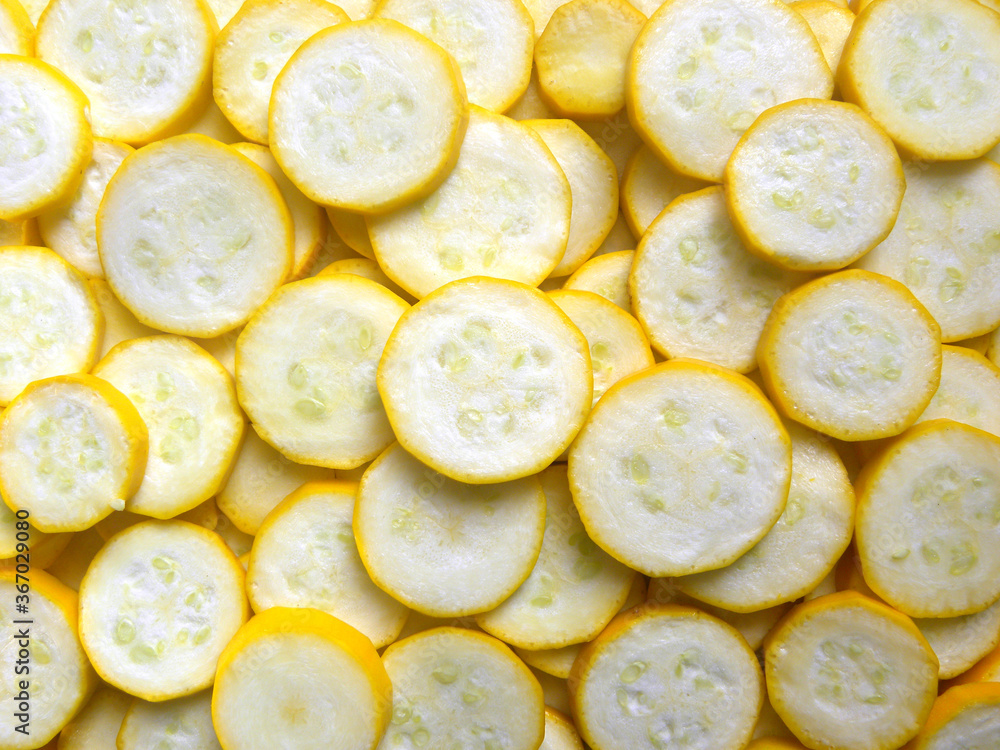 White and yellow color sliced cut Golden zucchini vegetable White and yellow color sliced cut Golden zucchini vegetable