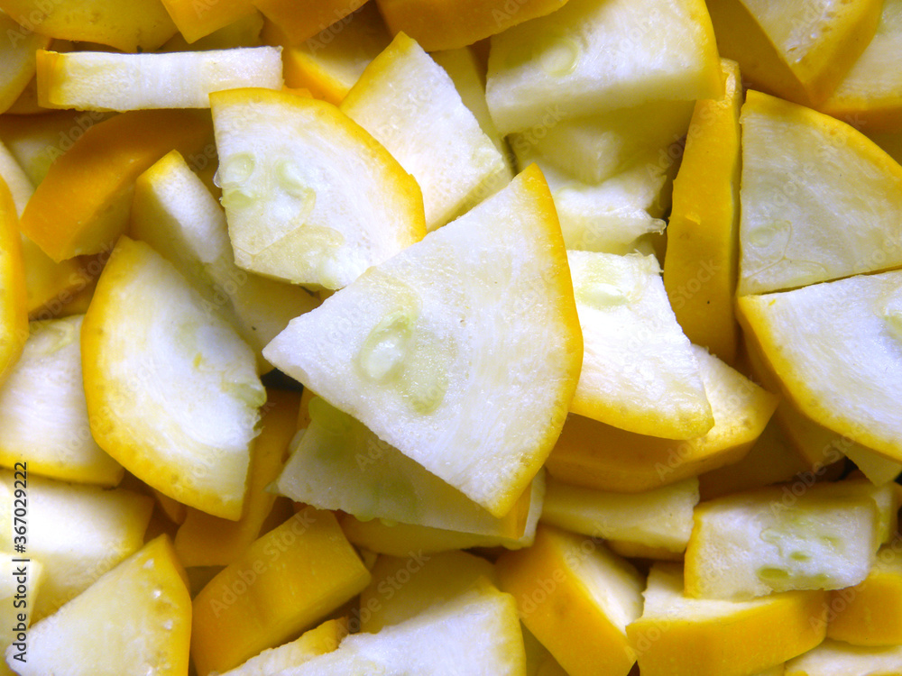 White and yellow color diced cut Golden zucchini vegetable White and yellow color diced cut Golden zucchini vegetable