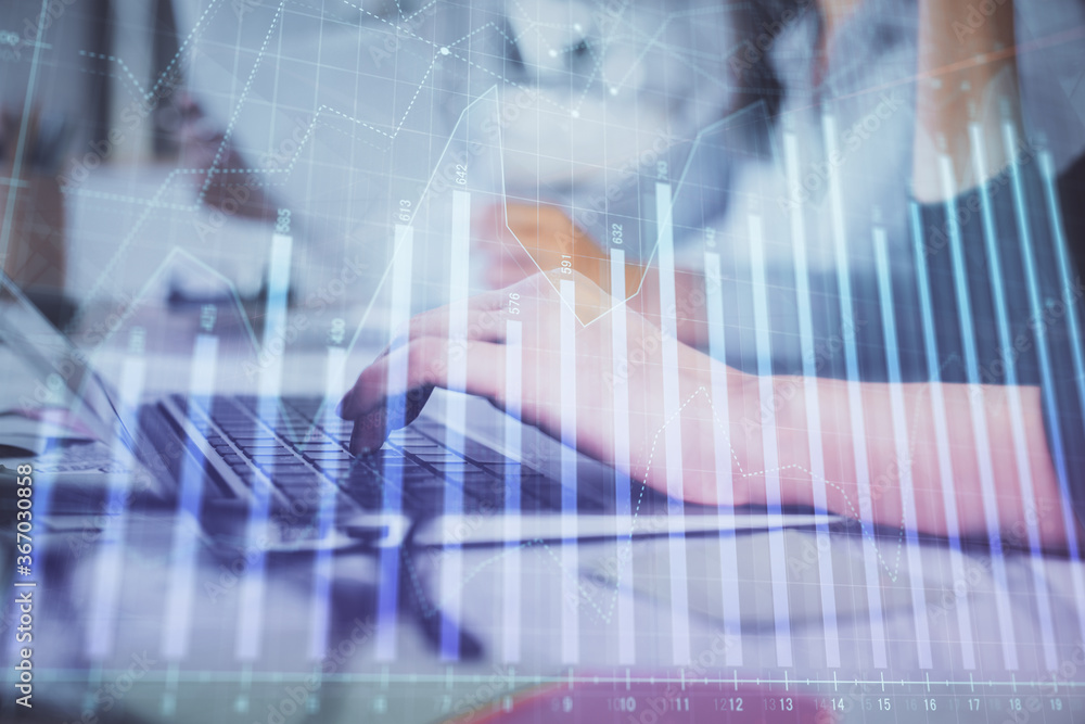 Multi exposure of woman hands typing on computer and financial graph hologram drawing. Stock market analysis concept. Multi exposure of woman hands typing on computer and financial graph hologram drawing. Stock market analysis concept.