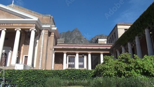 HD sunny day video of spectacular University of Cape Town, its sport grounds, green trees, old buildings and shady alleys in Western Cape, Cape Town, South Africa photo