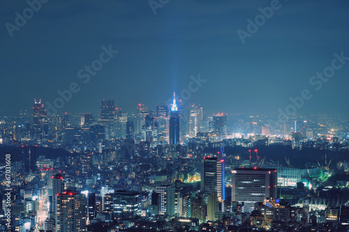 Tokyo, Japan - February 3, 2018: Modern cityscape building aerial view at night, capital city of Japan, business city concept image, shot in Roppongi Hills of Minato Ward, Tokyo, Japan.