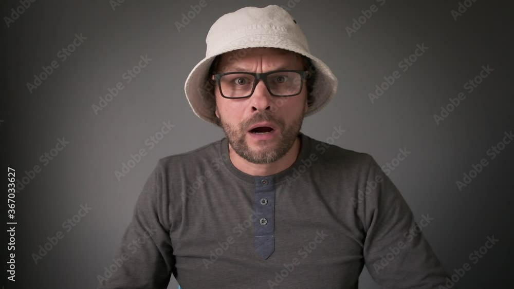Shocked surprised Middle-aged man showing face palm gesture into camera, emotional disappointment. Shocked surprised Middle-aged man showing face palm gesture into camera, emotional disappointment.