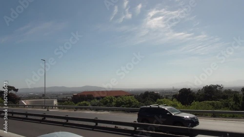 HD sunny day video of spectacular University of Cape Town, its sport grounds, green trees, old buildings and shady alleys in Western Cape, Cape Town, South Africa photo