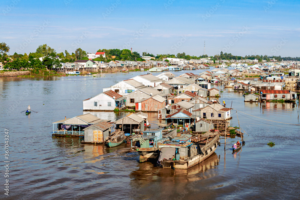 Rafting and aquaculture village on Chau Doc river, Vietnam. Rafting and aquaculture village on Chau Doc river, Vietnam.