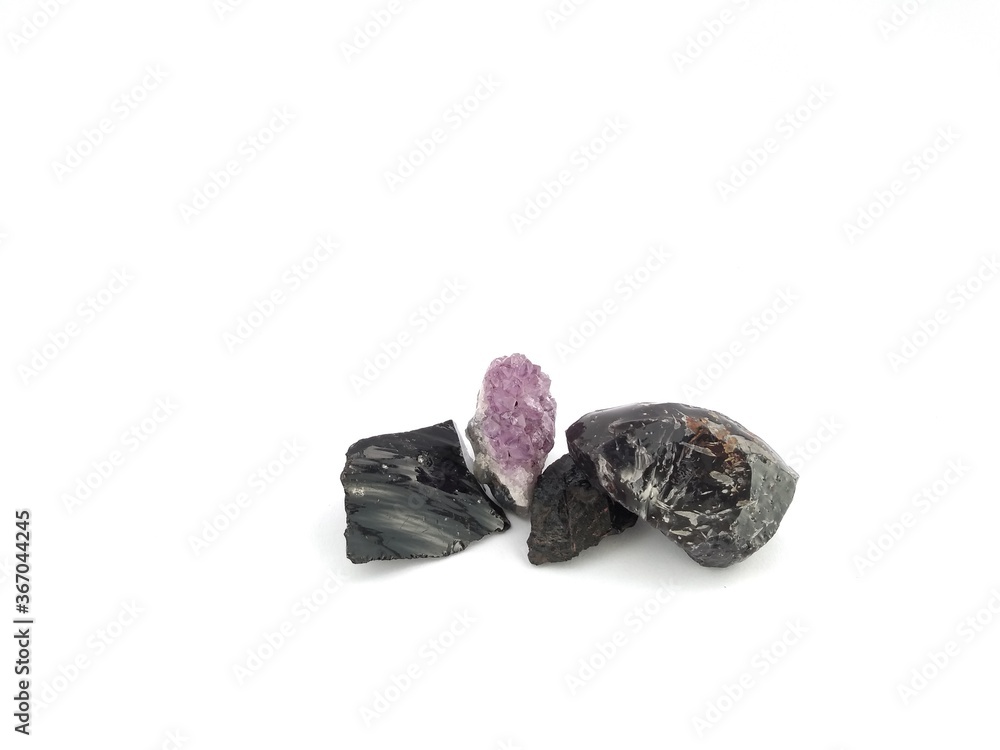 four mineral stones on white background four mineral stones on white background