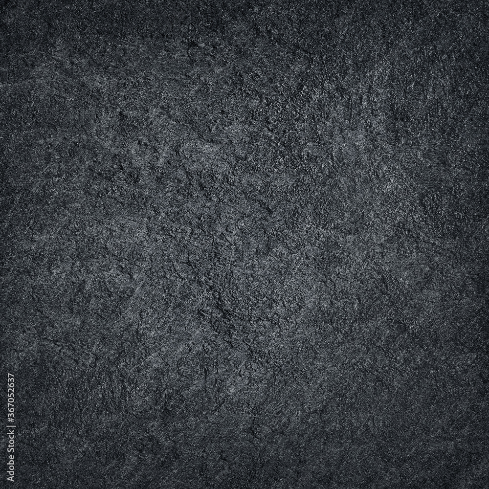 Fototapeta premium Dark grey stone / black slate stone background or texture