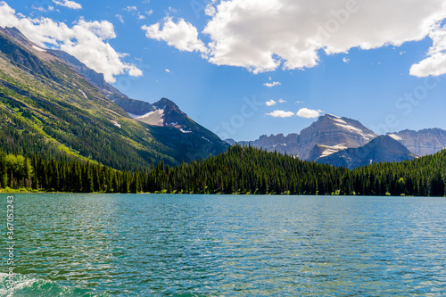 Mountains across the Swiftcurrent Lake  Montana