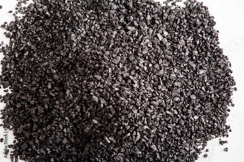 Black activated carbon particle