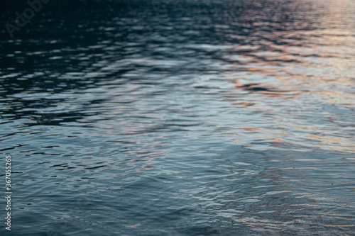 Ripples on surface of a river during sunset