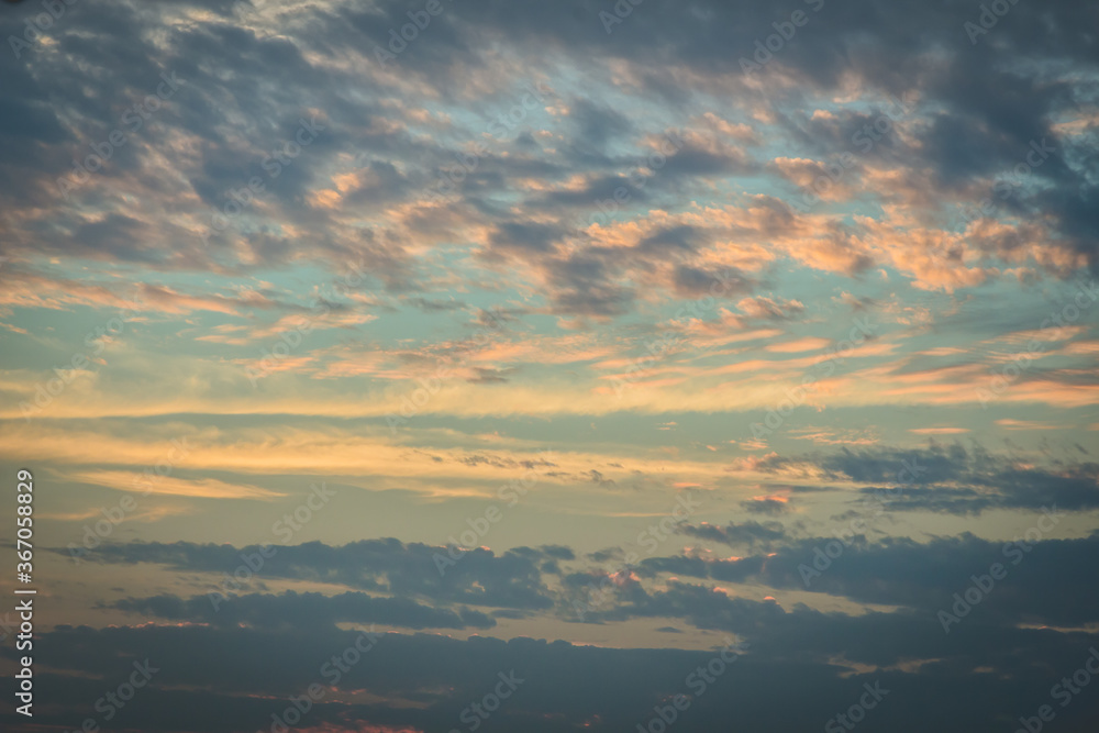 Obraz premium Sunset with clouds and light rays other atmospheric effect for use as a background image