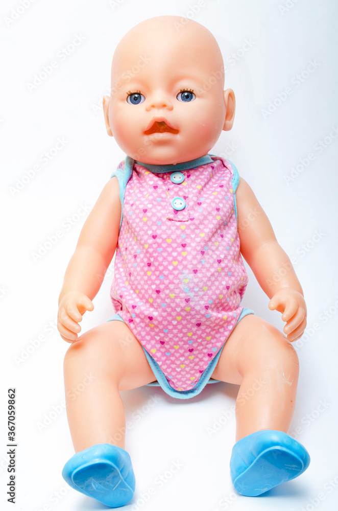 Original doll Baby Born on a white background in close-up. Doll general plan and in close-up to separate parts of the body, face. Baby Born. July 2020. Los Angeles, USA Original doll Baby Born on a white background in close-up. Doll general plan and in close-up to separate parts of the body, face. Baby Born. July 2020. Los Angeles, USA