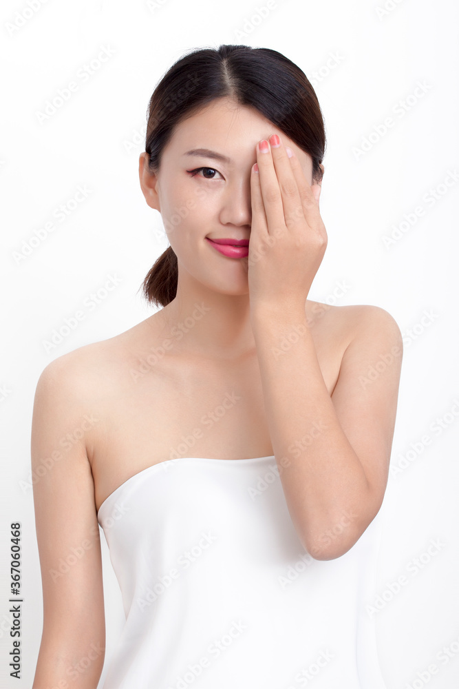 Bust portrait of female bath towel with light makeup Bust portrait of female bath towel with light makeup