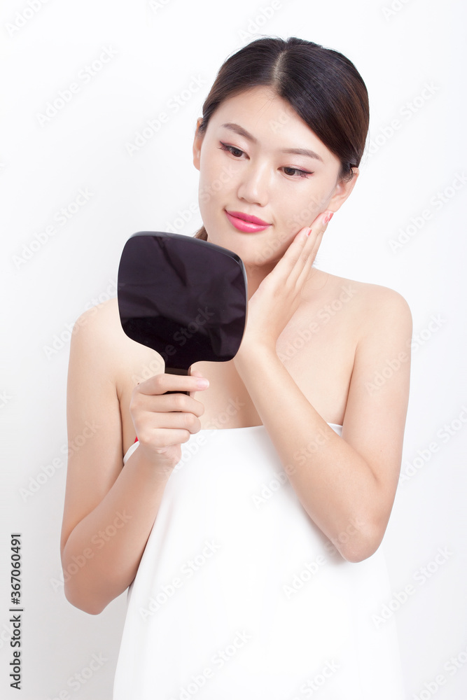 Bust portrait of female bath towel with light makeup Bust portrait of female bath towel with light makeup