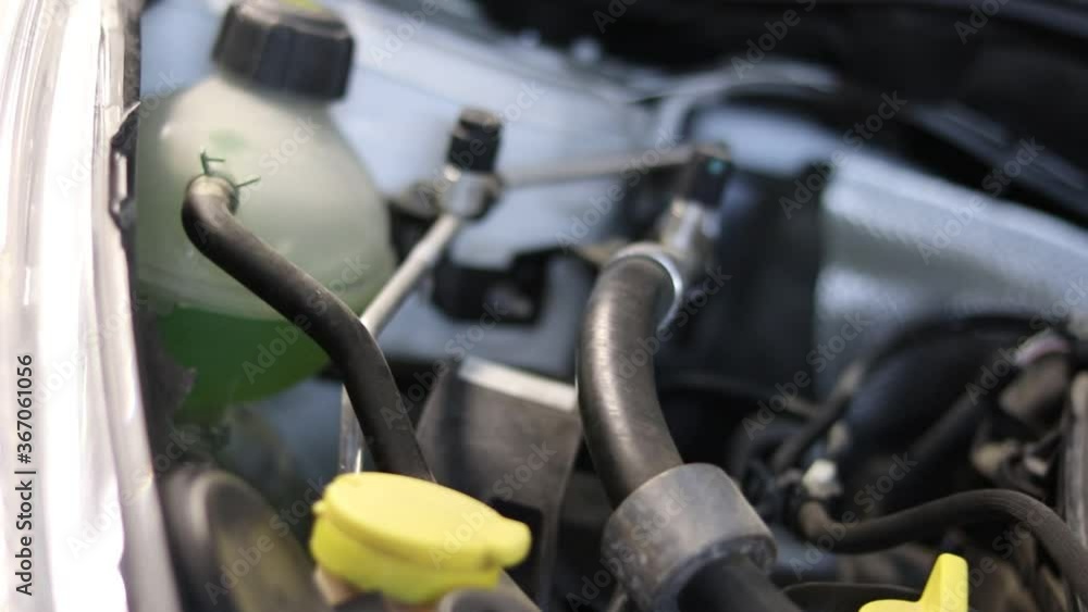 zoom out from engine compartment slow motion car hood zoom out from engine compartment slow motion car hood