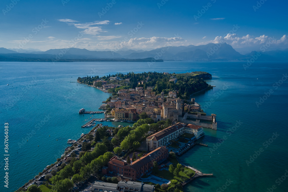 Castle Rocca Scaligera in Sirmione, Garda Lake. View by Drone. Panoramic aerial view of the historic city of Sirmione