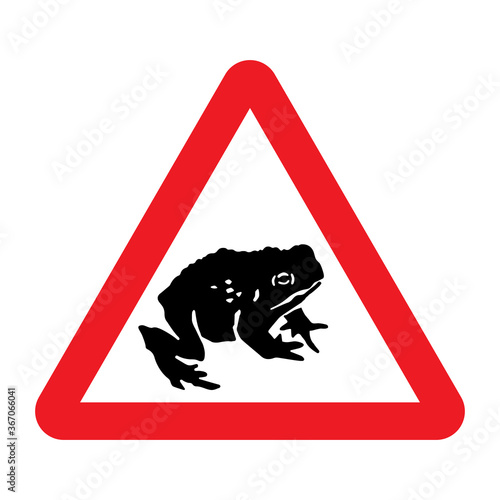 Migratory toad crossing ahead road sign. Red triangle warning traffic sign attention frog crossing the road. Migration and save frogs. Vector illustration.