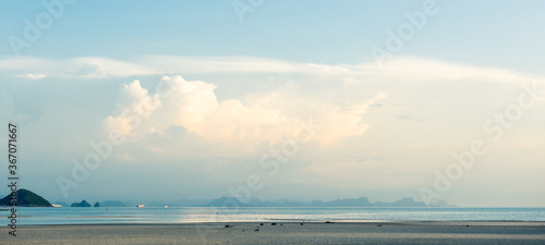 Summer seascape bright blue sea sky white clouds background