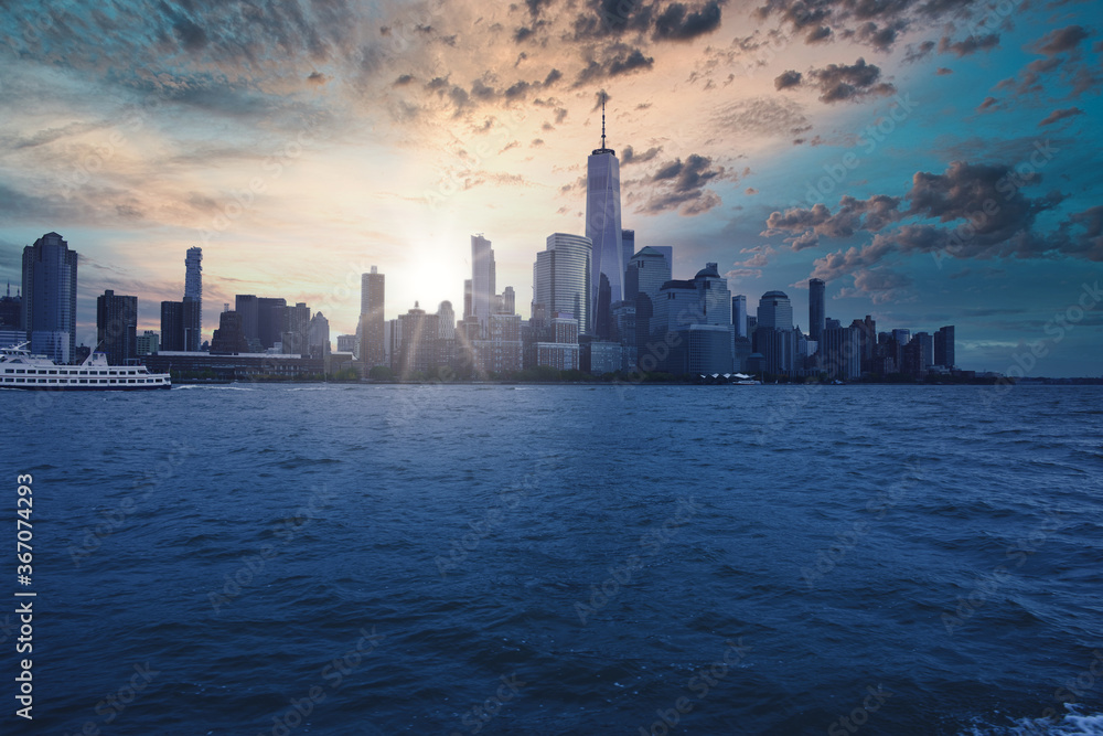 Manhattan New York City sunset view from the Hudson river, Midtown and downtown districts Manhattan New York City sunset view from the Hudson river, Midtown and downtown districts