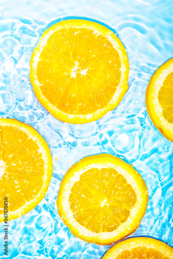 Cool splash orange slice in summer Cool splash orange slice in summer