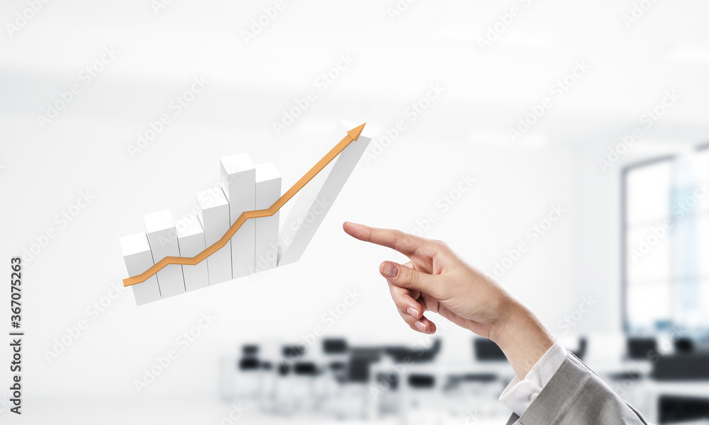 Concept of financial growth and progress with arrow in modern interior. Mixed media Concept of financial growth and progress with arrow in modern interior. Mixed media