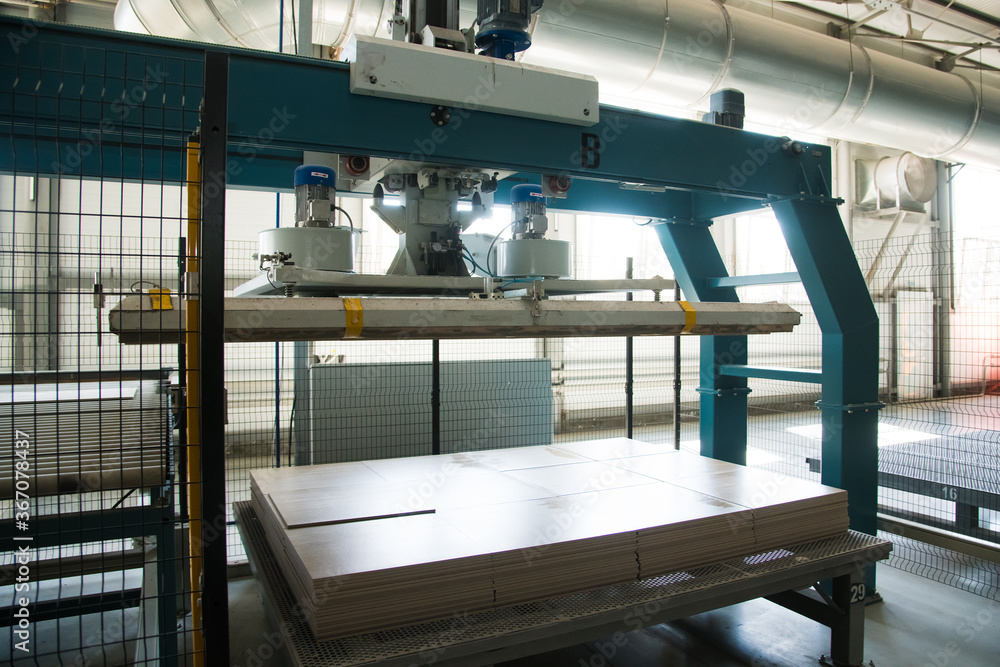 Factory for production of ceramic tiles. Conveyor line for ceramic tile at heavy plant Factory for production of ceramic tiles. Conveyor line for ceramic tile at heavy plant