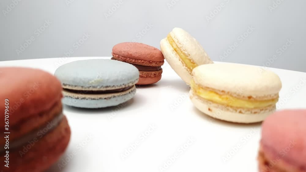 macarons from natural ingredients and dyes on white table. macarons from natural ingredients and dyes on white table.