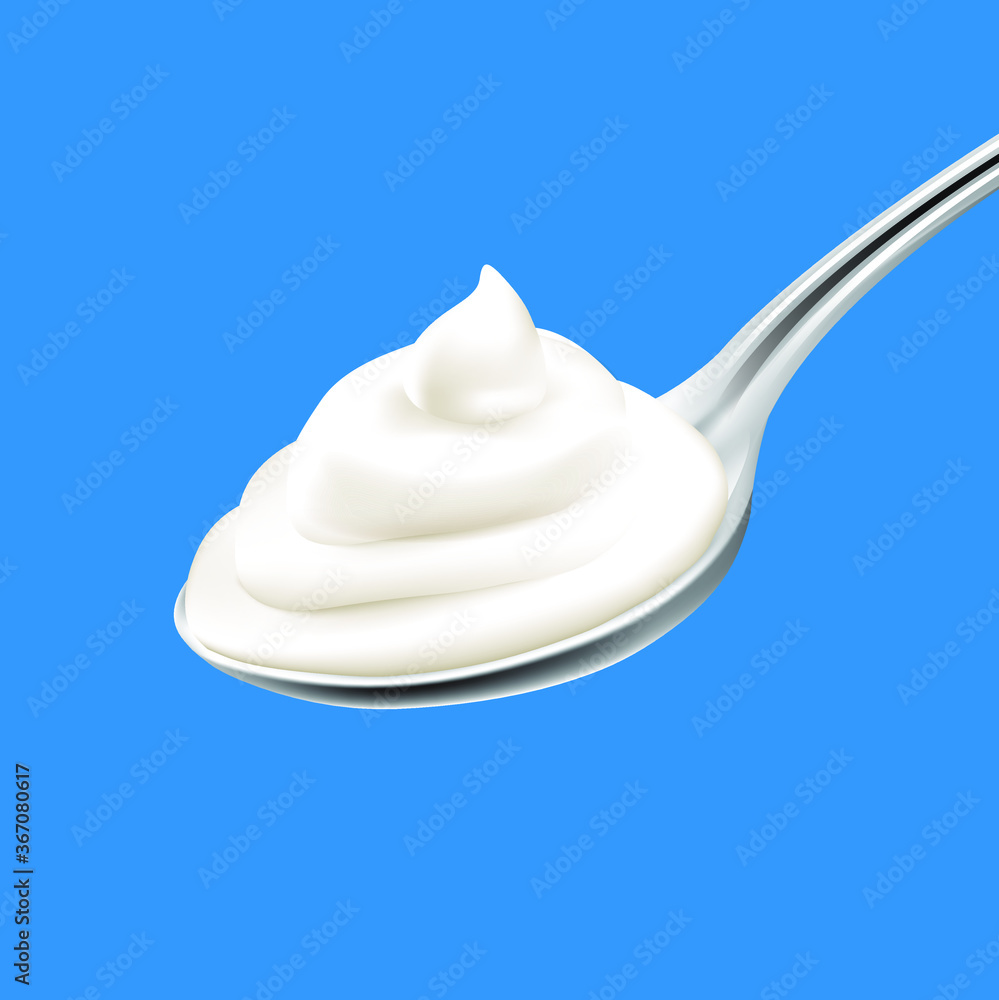 Spoon of yogurt on blue background Spoon of yogurt on blue background