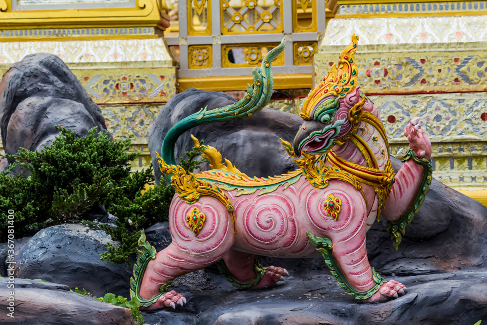 Fototapeta premium Close-up Himmapan animal statue in temple Thailand.