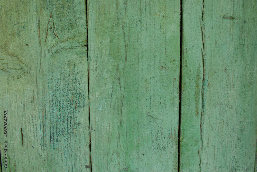 Naklejka premium Old tumbledown weathered vertical wood boards background with cracks, shabby rustic blue barn timbered siding aged withered faded flooring surface. Obsolete wall blank abstract rustic rundown texture.