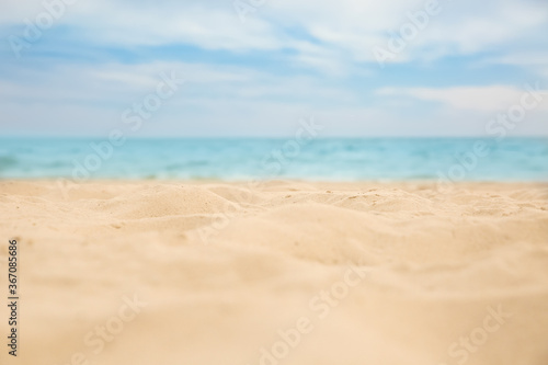 Beautiful sandy beach and sea on sunny day, closeup. Summer vacation © New Africa