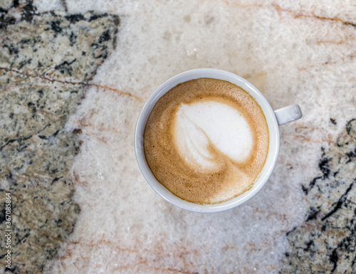 Italian cappuccino coffee cup on marble table surface