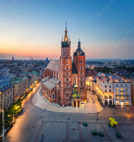 Krakow, Poland. Aerial view of illuminated St. Mary's Basilica (Bazylika Mariacka) on sunrise