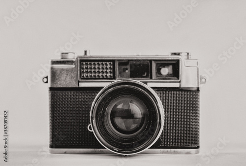 old vintage camera isolated on white photo